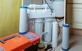 How does a typical household water filtration system work?